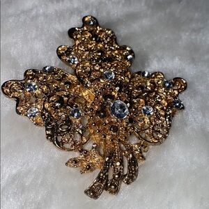 Gold tone faux  diamond costume pin brooch